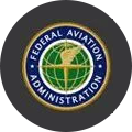 Federal Aviation Administration (FAA) logo featuring a globe with a gold winged staff, surrounded by a blue ring with the words Federal Aviation Administration in white letters.